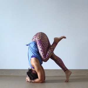 Once your hips are above your shoulders, try bending one knee in to the chest.