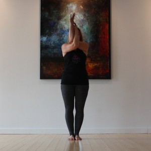 Start in mountain pose. Begin to cross the arms and wrap them to your comfort. Start with the left arm on top of the right.